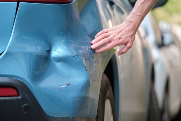 Dent on a car bumper